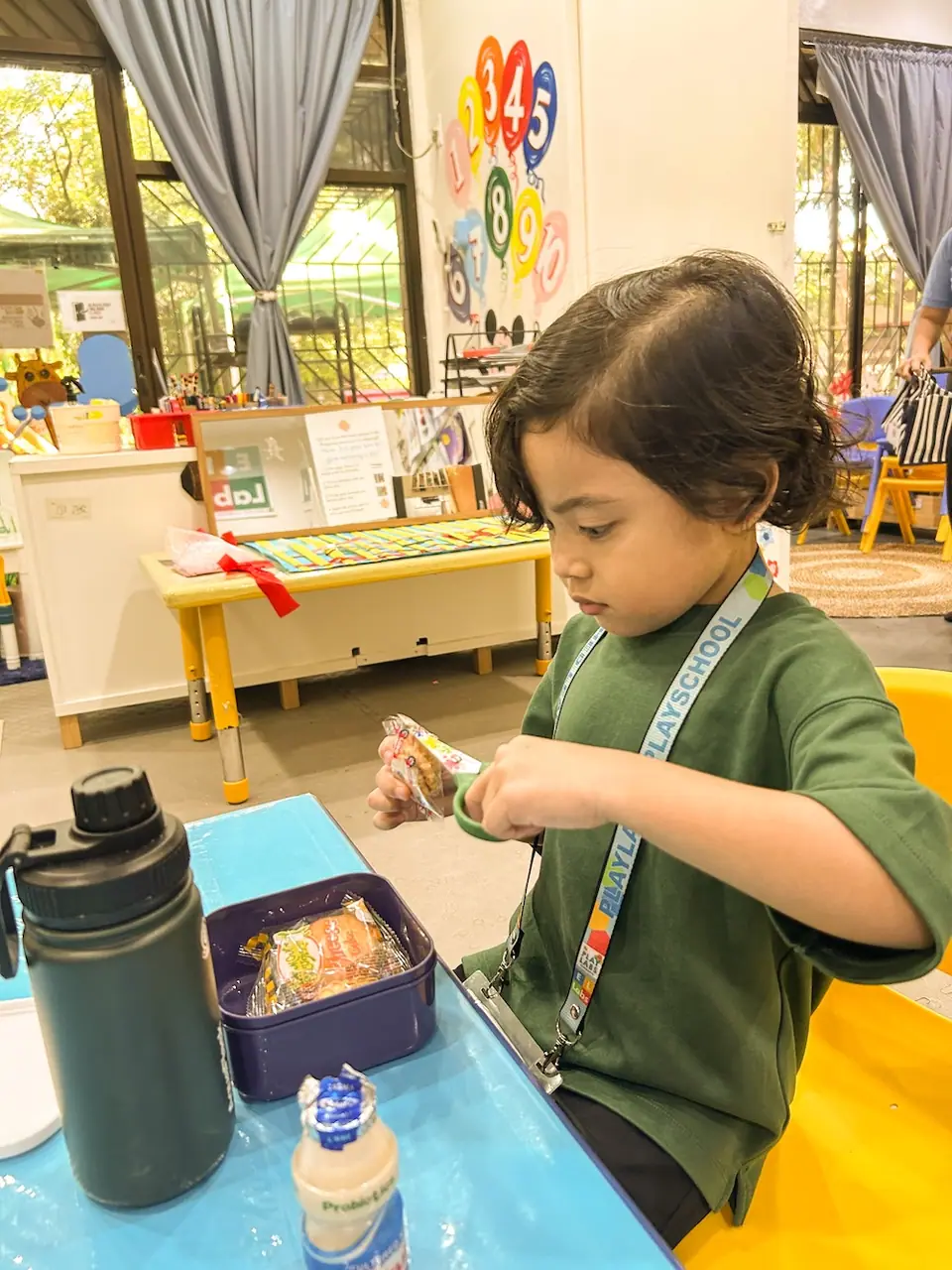 Child concentrating on a hands-on activity
